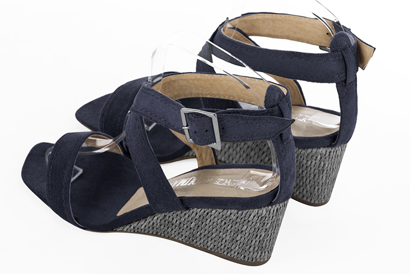 Navy blue women's fully open sandals, with crossed straps. Square toe. Medium wedge heels. Rear view - Florence KOOIJMAN